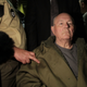 John Demjanjuk leaves a Munich court in May 12, 2011 after being sentenced to five years in prison for charges related to 28,060 counts of accessory to murder.